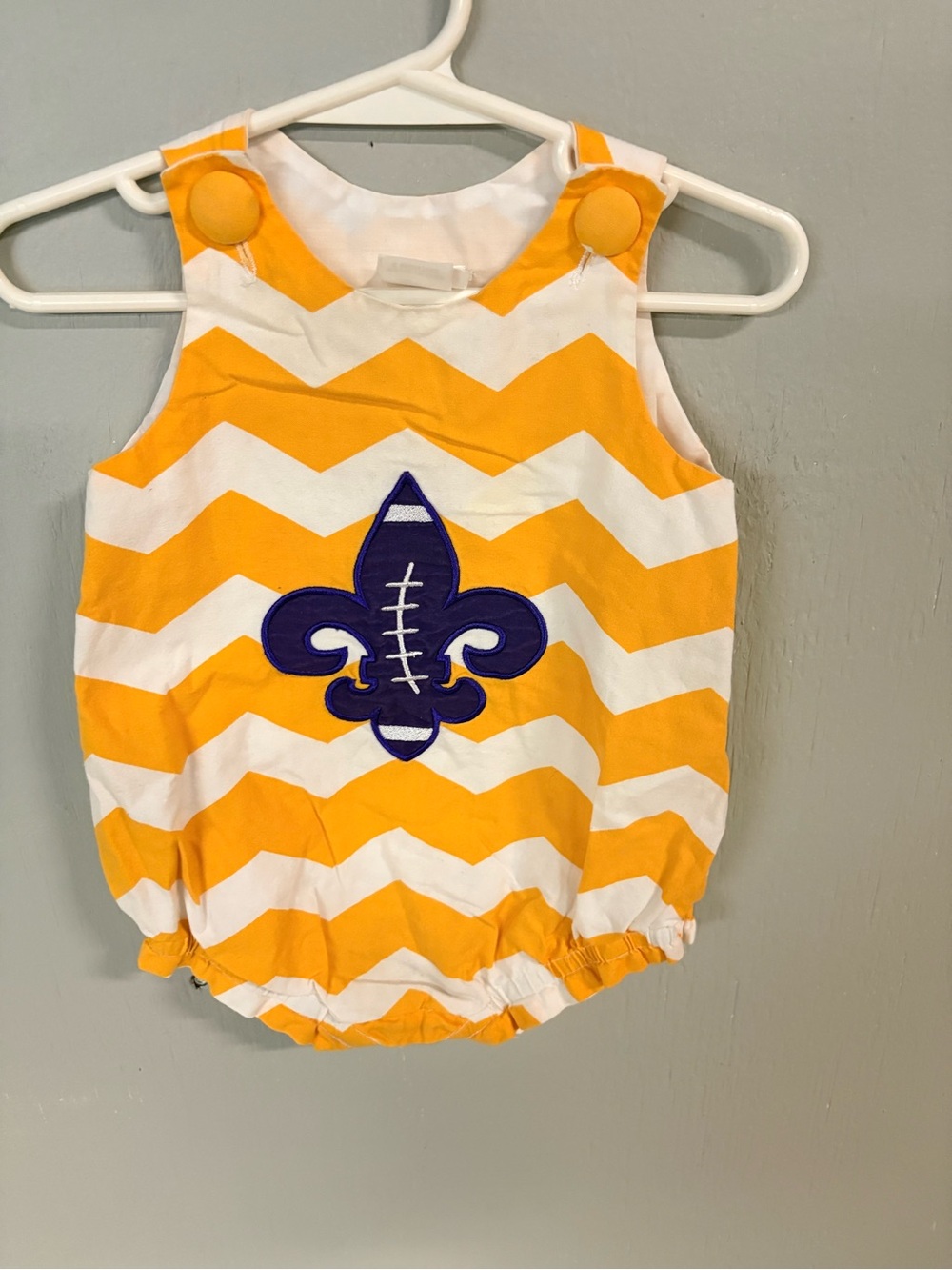 Ainsley Yellow and White Chevron Romper with Purple Fleur-de-Lis Applique